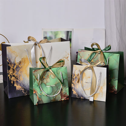 New Marbling Gift Bag Fashion Handbag with Ribbon Packaging Bag in Stock Clothing Paper Bag Candy Bag