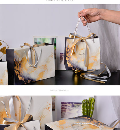 New Marbling Gift Bag Fashion Handbag with Ribbon Packaging Bag in Stock Clothing Paper Bag Candy Bag