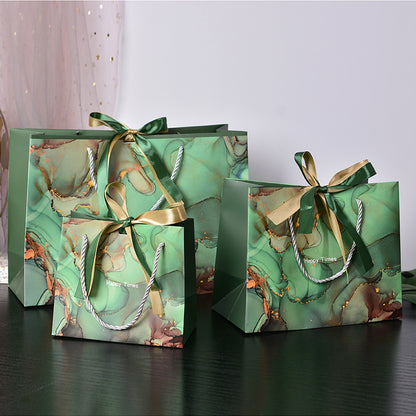 New Marbling Gift Bag Fashion Handbag with Ribbon Packaging Bag in Stock Clothing Paper Bag Candy Bag